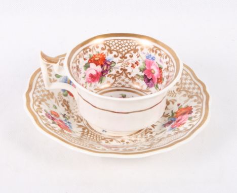 A 19th Century porcelain part teaset painted floral reserves on a gilt ground, comprising six tea cups, six coffee cups, elev