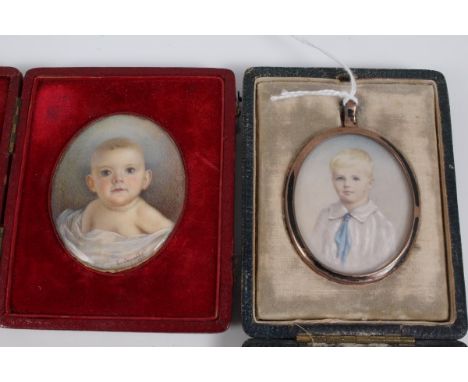 Edwardian oval portrait miniature on ivory of a baby, signed and dated 1911, in original red leather folding case, 5cm x 4cm 