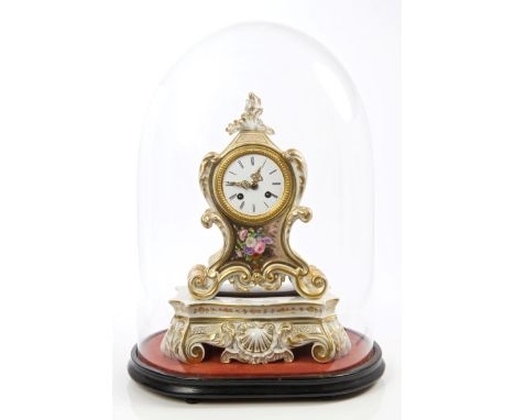 19th century mantel clock with French eight day movement striking on a bell, white enamel dial with Roman numerals and pierce