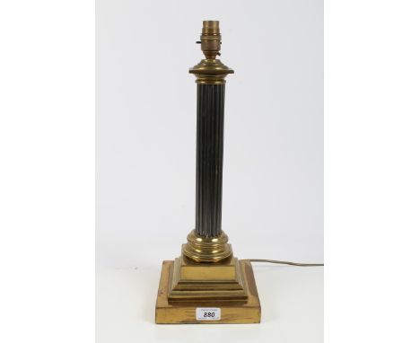 Edwardian brass table lamp of column form, on a stepped base, with bronzed reeded column, 46cm overall height