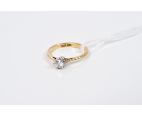 Diamond single stone ring with a brilliant cut diamond estimated to weigh approximately 0.25 carats, in claw setting, on gold
