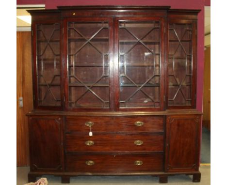 Good quality 19th century mahogany two height breakfront bookcase with moulded cornice and four astragal glazed doors above e