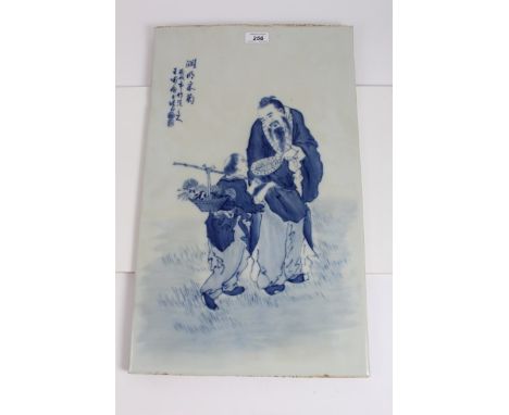 Chinese blue and white porcelain panel, painted with figures in conversation, script to corner, 54.5cm x 32cm CONDITION REPOR