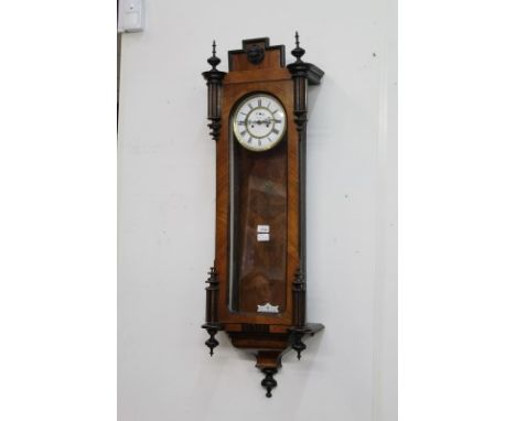 Late 19th century Vienna Regulator wall clock with eight day double weight movement striking on a gong, white enamel dial wit