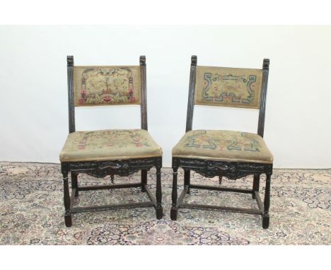 Pair of 19th century Italian carved oak side chairs with floral tapestry seats and backs, carved lion head terminals, carved 