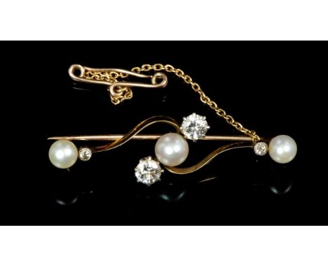 Edwardian diamond and pearl bar brooch with central button-shape pearl flanked by two old cut diamonds in cross-over setting 