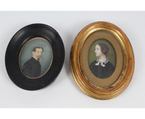 Alberto Prosdocimi (1852 - 1925), pair portrait miniatures - lady and gentleman, in oval frames, one gilt, one ebonised, 6.5c