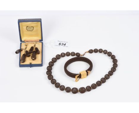 Victorian hairwork jewellery to include a necklace with finely woven graduated spherical beads, bangle with engraved yellow m