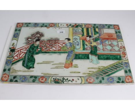 Chinese rectangular famille rose panel, painted with figures in a fenced courtyard, 32.5cm x 50cm CONDITION REPORT Good condi
