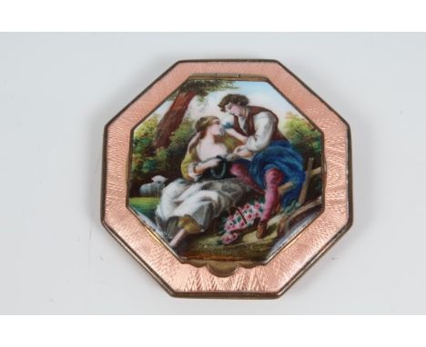 Early 20th century octagonal enamel compact, with engine-turned body with translucent peach enamel, the hinged cover with gal