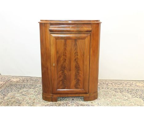 19th century mahogany Biedermeier floor-standing corner cupboard with frieze drawer and panel door below, on bracket feet, 12