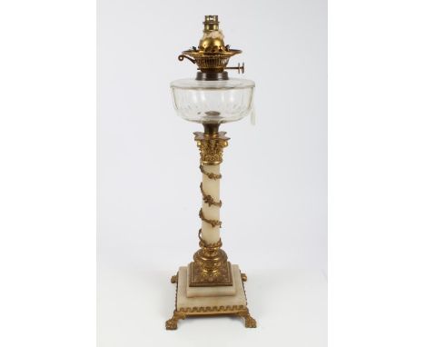 Victorian oil lamp converted to electricity, with slice cut glass reservoir, raised on gilt brass and alabaster Corinthian co