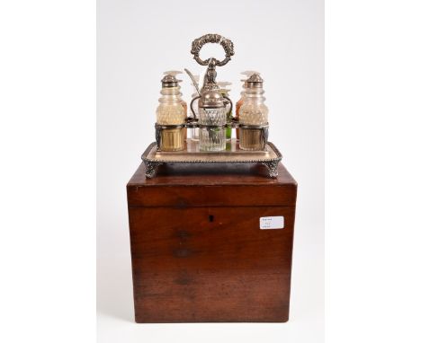 George IV silver plated seven piece cruet of rectangular form, with gadrooned border and reeded wire frame and foliate decora