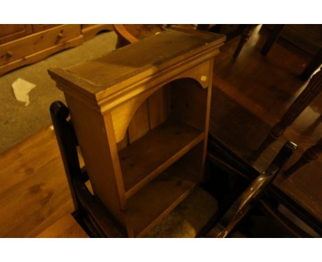 A stripped pine and glazed corner cabinet; and a pine wall shelf 