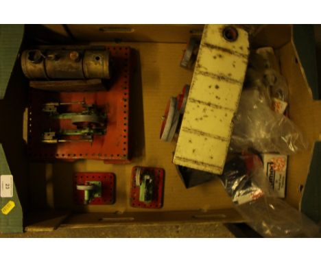 A box containing Mamod steam tractor and other Mamod items 