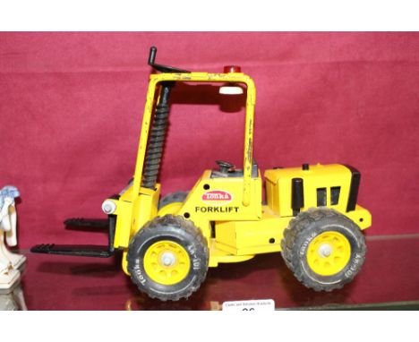 A Tonka toy fork lift 