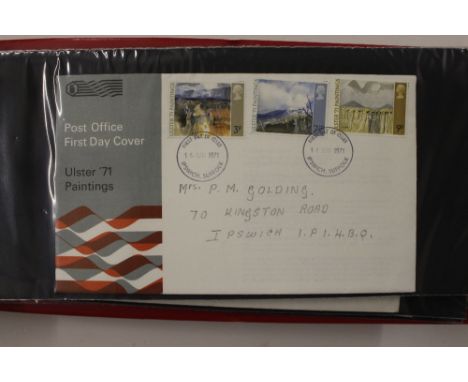 Four albums of First Day covers 