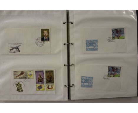 Four albums of First Day covers 