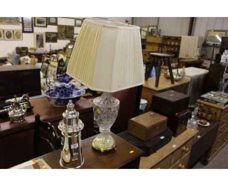 A brass and glass table lamp with shade 