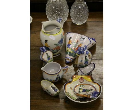 Quantity of Quimper pottery to include jugs, bell, shoes, dishes etc