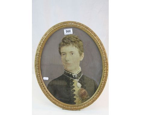 19th Century oval portrait of a gentleman in costume, highlighted in watercolour