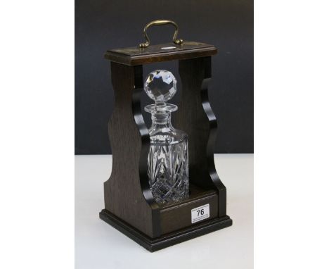 Single bottle Oak Tantalus with Brass fittings &amp; cut Glass decanter with stopper, stands approx 31cm not counting the car