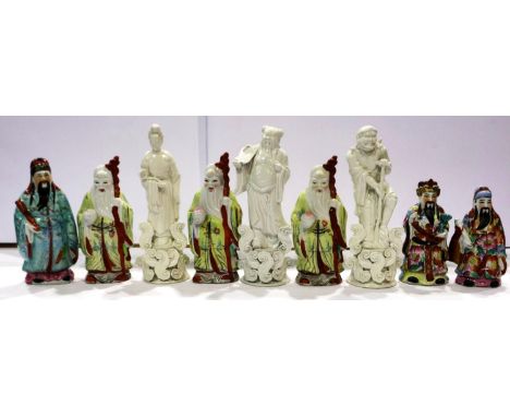 Nine Oriental ceramic figurines, including blanc de Chine examples, largest H: 26 cm, no chips or cracks. P&amp;P Group 3 (£2