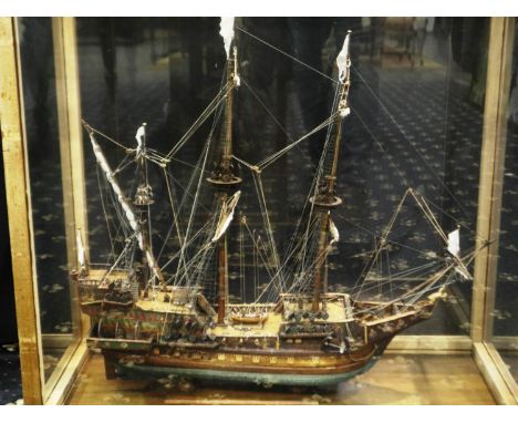 Glass cased handmade wooden model of a 17th century three most sailing ship, museum quality approximately 1/60 scale ship, L: