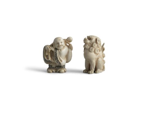 A FINELY CARVED JAPANESE OKIMONO, 19th century, modelled as a seated shishi, with curled mane and tail, 5.5cm high; together 