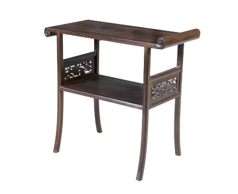 A CHINESE HARDWOOD TWO-TIER SIDE TABLE, of rectangular form, the plain top with opposing scroll ends, the sides carved with p