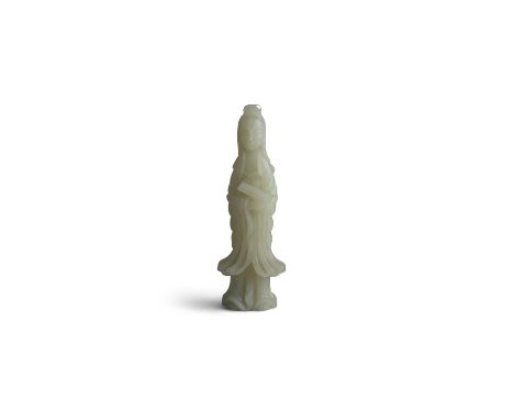 A WHITE JADE FIGURE OF GUANYIN, 19th century, in standing position, wearing loose robes and and holding a scroll in her right