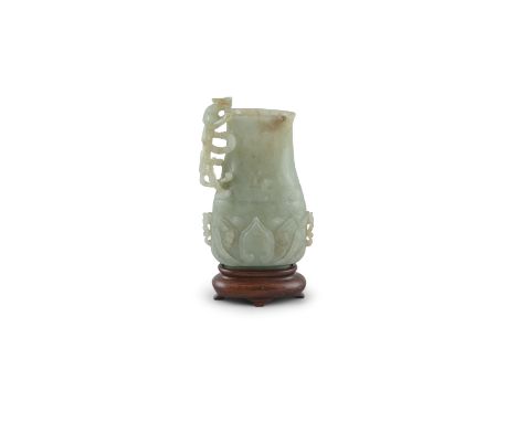 A PALE CELADON JADE VESSEL, 18th century, of flattened baluster form, with chilong side handle, the body with strapwork bandi