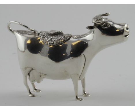 Very early 20th century Netherlands silver figural cow creamer,  with marks under the lid which appear to date the item to 19