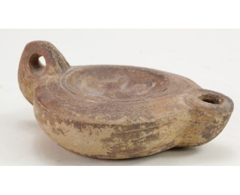 Ancientr Roman Terracotta Oil Lamp , ca. 200 - 300 AD; well preserved with central section depicting a dog; 90mm; Property of