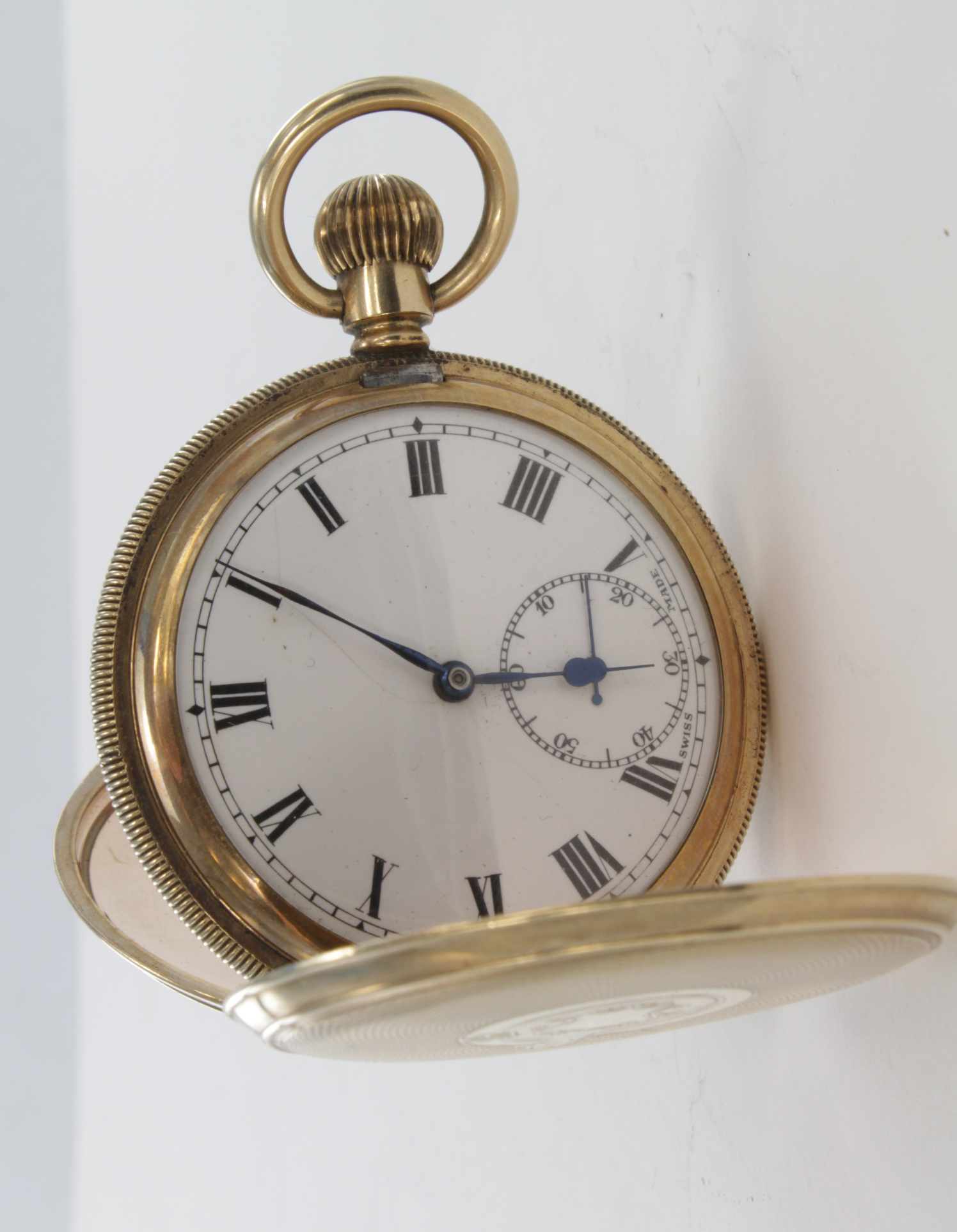 Elgin Full Hunter gold plated pocket watch. The white dial with roman