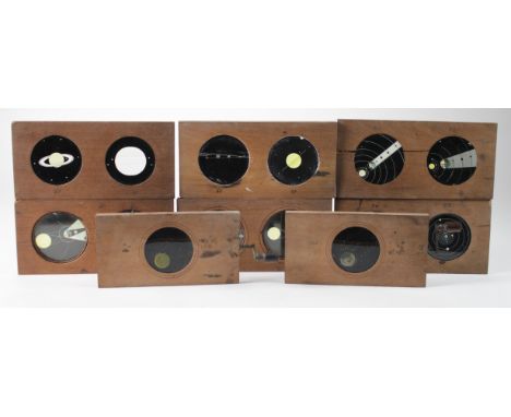 Astronomy interest. A collection of eight astronomy related magic latern slides, depicting planets etc., including two with w