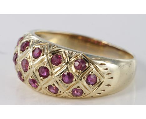 14ct yellow gold ruby set domed ring, size M, weight 4.1g.