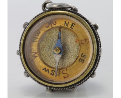Victorian / Edwardian Compass with an enamelled back depicting a cricketer