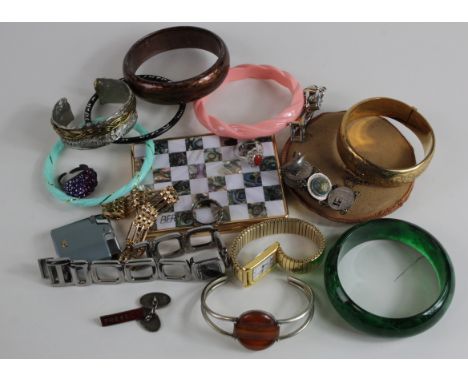 A small tin of mixed bangles, bracelets, compact mirror and watches mainly costume. 