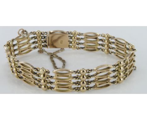 15ct four bar gate bracelet (approx 7 - 8 inches) total weight 23.5g