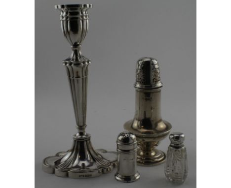 Four silver items, candlestick, sugar caster, perfume bottle and pepper - various hallmarks