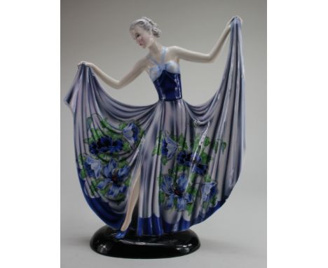 Goldscheider. Large German hand painted art deco porcelain figurine by Goldscheider, depicting a female wearing a large blue 