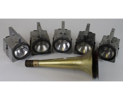 Five British Rail Bardic lamps, comprising four drivers & one guards lamp, together with two horn trumpets (possibly for clas