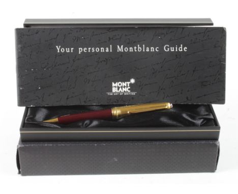 Montblanc Meisterstuck burgundy and gilt ballpoint pen (serial no. IG105350), contained in original box with a personal guide