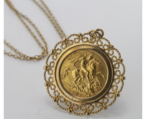 Half Sovereign dated 1907 in an ornate mount attached to a 9ct chain, total weight 9g