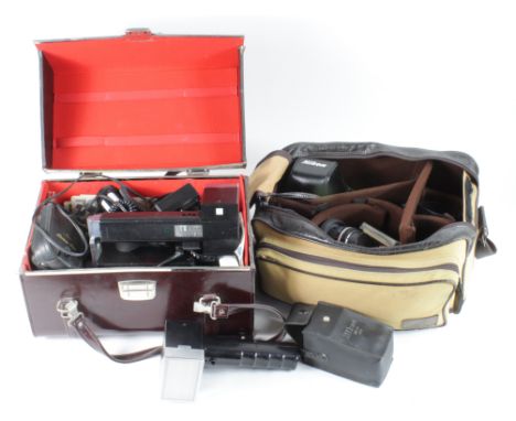 Photography interest. A collection of photography equipment, including Nikon F501 camera, Metz 402 Flash, Nikon lenses, etc.