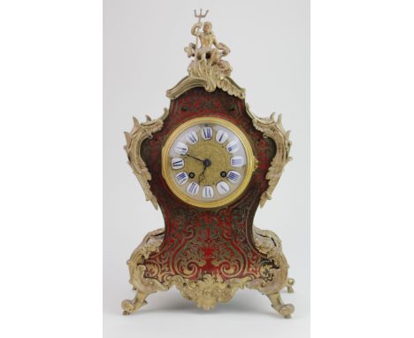 Ornate tortoiseshell and brass mounted mantle clock, with gilt finial depicting 'Poseidon', circa 19th Century, movement stam