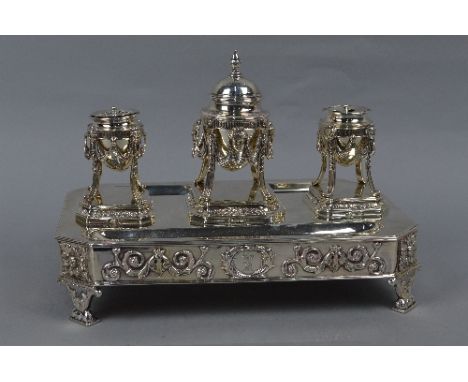 A GEORGE III SILVER STANDISH OF NEO-CLASSICAL DESIGN, the rectangular tray with canted corners fitted with a pen recess to ei