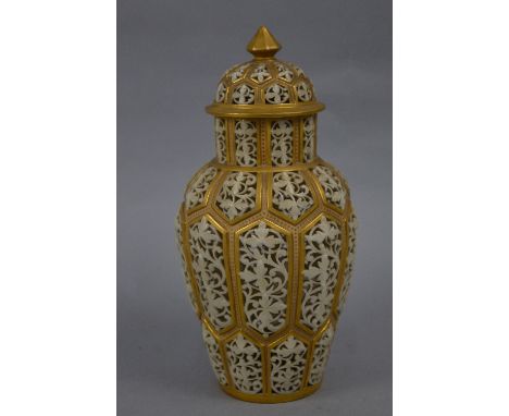 A LATE VICTORIAN GRAINGER & CO WORCESTER RETICULATED VASE AND COVER, the domed cover with octagonal finial, the cover and vas