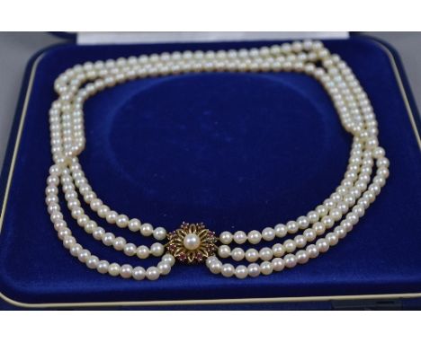 A LATE 20TH CENTURY THREE ROW CULTURED PEARL NECKLET, three rows of uniform Akoya cultured pearls, measuring approximately 22
